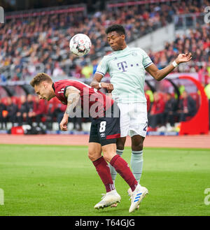 David ALABA, FCB 27 competere per la palla, affrontando, duello, intestazione zweikampf, azione, lotta contro Robert BAUER, FCN 8 1.FC Norimberga - FC Bayern Munich - DFL REGOLAMENTI VIETANO QUALSIASI USO DI FOTOGRAFIE come sequenze di immagini e/o quasi-VIDEO - 1.della Lega calcio tedesca , Norimberga, 28 aprile 2019 la stagione 2018/2019, giornata 31, FCB, München, Nürnberg © Peter Schatz / Alamy Live News Foto Stock