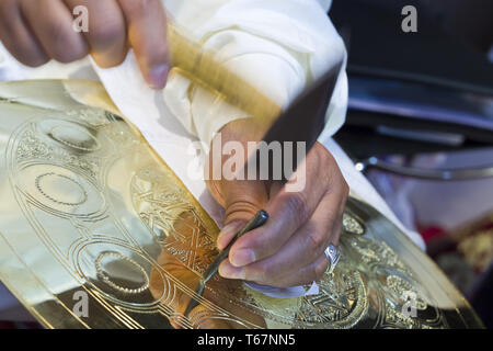 La scriccatura rame stagnato Foto Stock