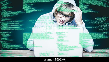 Immagine composita dell Uomo in camicia cappa hacking di un laptop Foto Stock