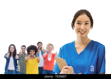 Immagine composita di infermiera asiatica con uno stetoscopio guardando la telecamera contro uno schermo bianco Foto Stock