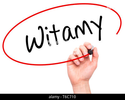 Man mano che scrive Witamy (benvenuti in polacco) con pennarello nero su schermo visivo. Foto Stock