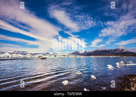 Nuvole Cirrocumulus laguna di Jokulsarlon Foto Stock