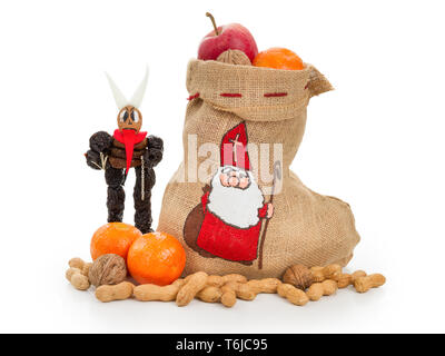 San Nicola e Krampus concept Foto Stock