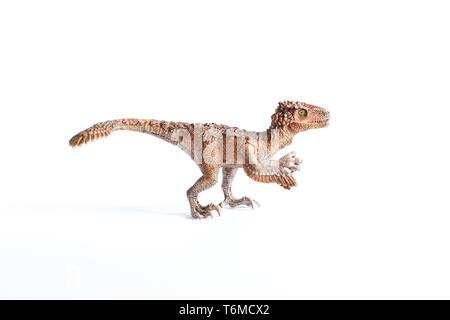 Dinosauro di plastica - toy isolato su bianco Foto Stock