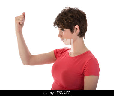 Arrabbiato donna mostrando il suo pugno Foto Stock