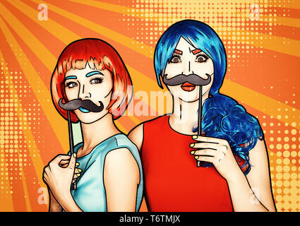 Le femmine in rosso e blu parrucche. Ragazze con false moustashes in mani Foto Stock