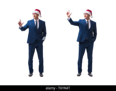 Giovani busnessman indossando santa hat nel concetto di natale su bianco Foto Stock