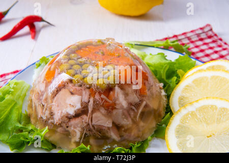 Aspic di gustosi con carne di maiale il fuso a snodo e le cosce Foto Stock