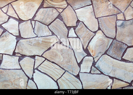 Blocco di pietra naturale texture di pavimentazione di close-up. Costruzione di sfondo. Foto Stock