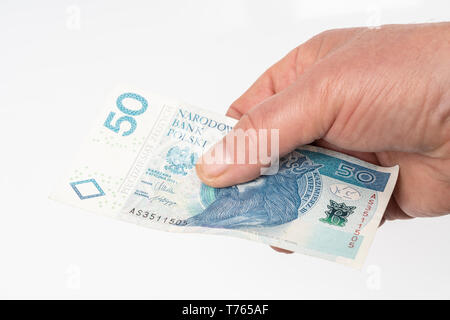 Una banconota da 50 zloty polacco per la mano Foto Stock