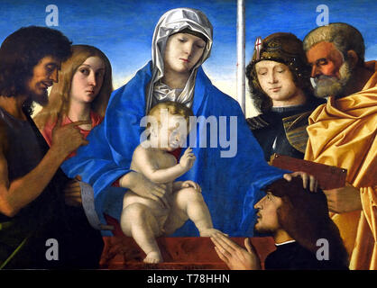 La Vergine e il Bambino circondati da San Giovanni Battista, Maria Maddalena, San Giorgio, San Pietro e un donatore di 1490 - 1500 da Giovanni Bellini e workshop noto a Venezia nel 1459 - 1516, Foto Stock