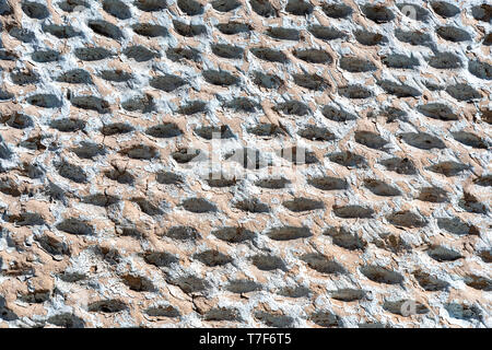 Ruvido weathered muro di pietra come creativo texture di sfondo Foto Stock