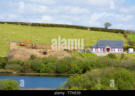 Inizio lavoro su un alloggiamento nuovo complotto o sito in Irlanda rurale della contea di Donegal. Foto Stock