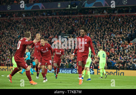 Liverpool. 8 Maggio, 2019. Liverpool Origi Divock (R, anteriore) celebra dopo rigature durante la UEFA Champions League Semi-Final seconda gamba match tra Liverpool FC ed FC Barcelona ad Anfield di Liverpool, in Gran Bretagna il 7 maggio 2019. Liverpool ha vinto 4-3 sull'aggregato e raggiunto la finale. Credito: Xinhua/Alamy Live News Foto Stock