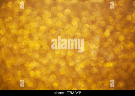 Golden bokeh sfondo sfocato Foto Stock