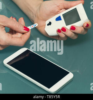 Personal Misuratore glicemia Foto Stock