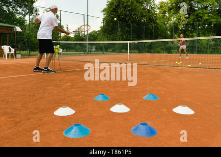 Lezione di tennis Foto Stock