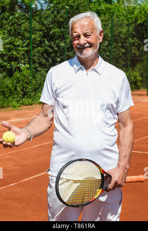 Senior giocatore di tennis Foto Stock