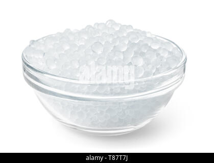 Vaso di vetro pieno di gel di silice in granuli isolato su bianco Foto Stock
