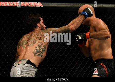 UFC 237: NAMAJUNAS vs. ANDRADE - Fighters BJPenn (red glove) e argilla Guida (blu guanto) durante UFC 237 scheda preliminare di lotta a Jeunesse Arena, Rio de Janeiro . Foto: Thiago Ribeiro / AGIF Foto Stock