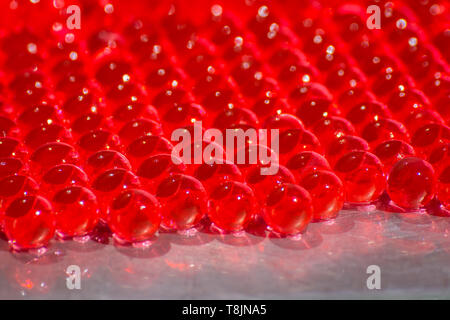 Bianco e blu le sfere di gel,palline di polimero Foto stock - Alamy