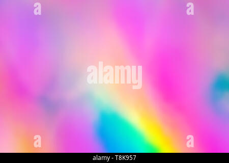 Colorata carta olografica con luci di Rainbow. Foto Stock