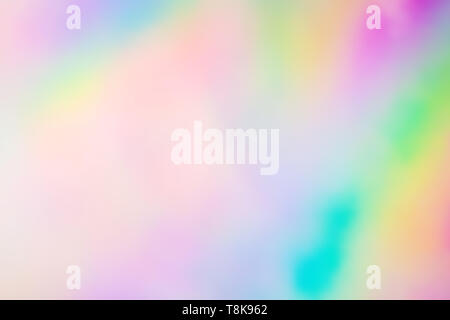 Colorata carta olografica con luci di Rainbow. Foto Stock