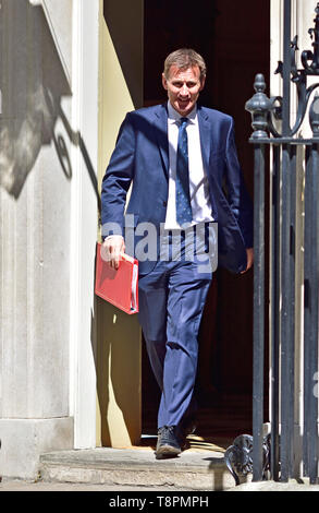 Jeremy Hunt MP - Il Segretario di Stato per gli Affari Esteri e del Commonwealth - lasciando prima della fine di una lunghissima Cabinet settimanale incontro a Downing Street, Westminster. Londra, Regno Unito. 14 maggio 2019. Foto Stock