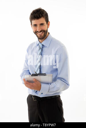 Ritratto di giovane uomo attraente con la barba occhi blu e uno splendido sorriso. Millenario modello hipster fiduciosi in posa e modellizzazione contro neut Foto Stock