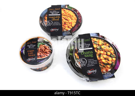 Mondo dimagrante Vegan Curry - vegetale Dhal, Chana Saag e rogan josh Sauce Foto Stock