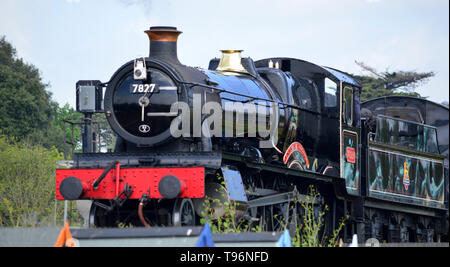 Lydham Manor motore a vapore No.7827, lasciando Goodrington/stazione di Paignton, Torbay, Devon, Inghilterra Foto Stock