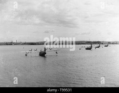 Quattro brevi BOAC Sandringhams ormeggiata nel porto di Poole e in attesa del loro destino. Foto Stock