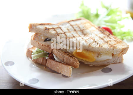 Sandwich di pancetta uovo Foto Stock