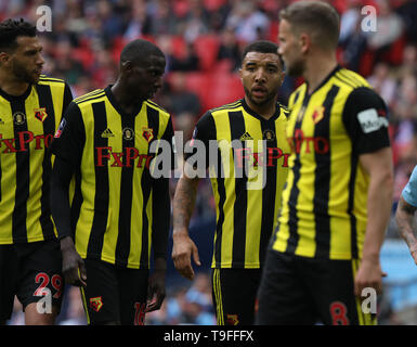 Londra, Regno Unito. 18 Maggio, 2019. Etienne Capoue (W), Abdoulaye Doucoure (W), Troy Deeney (W), Tom Cleverley (W) a Emirates finale di FA Cup, Manchester City v Watford, allo Stadio di Wembley, Londra, Regno Unito il 18 maggio 2019. **Solo uso editoriale, è richiesta una licenza per uso commerciale. Nessun uso in scommesse, giochi o un singolo giocatore/club/league pubblicazioni** Credito: Paolo Marriott/Alamy Live News Foto Stock