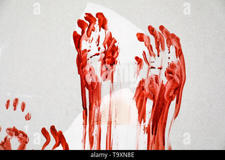 Bloody palm stampe su muro Foto Stock