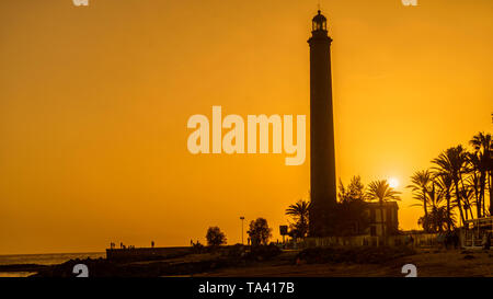 Tramonto sul faro di Maspalomas Foto Stock