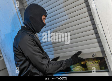 Ladro Symbolfoto, Einbrecher Symbolfoto Foto Stock