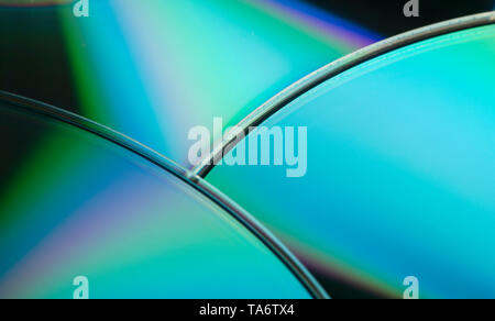 Sfondo colorato con scintillante compact disc. Foto Stock