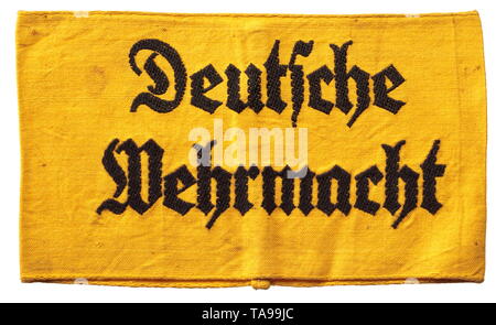 Una fascia da braccio 'Deutsche Wehrmacht' Gelb mit eingewebter schwarzer gotischer Aufschrift. Diente als Kennzeichnung des nicht uniformierten Personals der Wehrmacht, des sog. "Wehrmachtsgefolges', bzw. unterstellter Einheiten, die keine Wehrmachtsuniform trugen, z.B. Polizei- oder RAD-Angehörige. storica, storica del xx secolo, Editorial-Use-solo Foto Stock