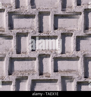 Seamless testurizzato recinzione in cemento dipinto di bianco. background e texture. Foto Stock