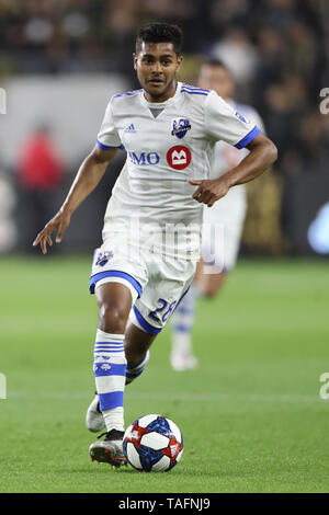 Los Angeles, CA, Stati Uniti d'America. 24 Maggio, 2019. Impatto di Montreal centrocampista Shamit Shome (28) porta la palla in avanti durante il gioco tra impatto di Montreal e Los Angeles FC a Banc della California Stadium di Los Angeles, CA, Stati Uniti d'America. (Foto di Peter Joneleit) Credito: csm/Alamy Live News Foto Stock