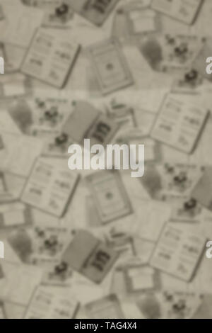 Sfondo di vecchi giornali. Texture di sfondo, vista dall'alto, offuscata Foto Stock