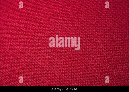 Decorativo astratto a trama tessile rosso Foto Stock