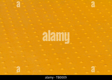 Yelloow pavimentazioni tattili urti close-up Foto Stock