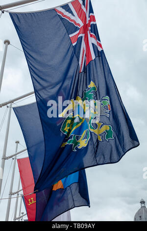 Bandiera Isole Pitcairn battenti nel vento, la piazza del Parlamento, Londra, UK celebra le dipendenze della Corona e territori d' oltremare. Foto Stock