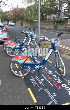 Ciclo di dh biciclette a noleggio trasporti pagare come vanno in bicicletta regime scozzese di Edimburgo bike per affitto regno unito Foto Stock