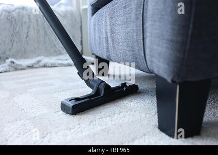 La pulizia della moquette home Foto Stock