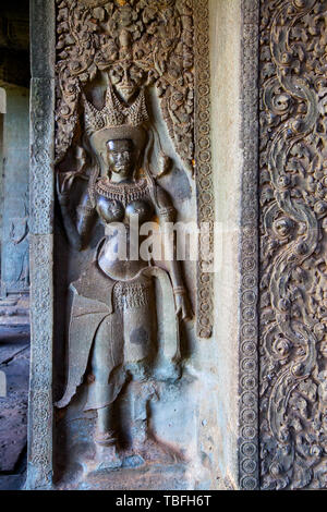 Antico bassorilievo in Angkor Wat, Cambogia Foto Stock