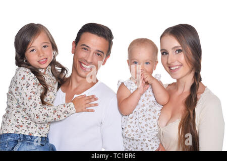 La famiglia felice di quattro su sfondo bianco Foto Stock