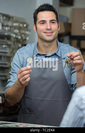 Il comando cobbler con il cliente Foto Stock